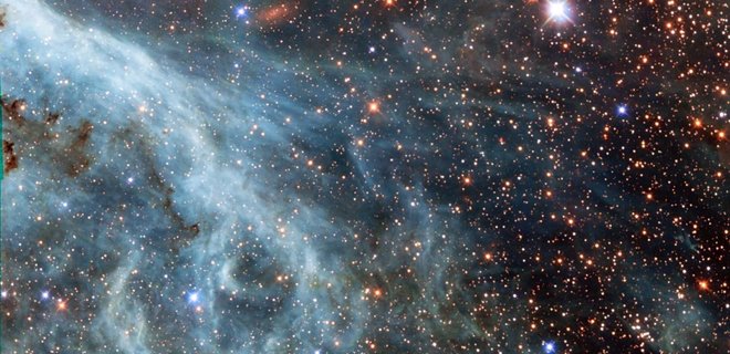 Исследователи показали галактику-спутник Млечного пути в голубых волнах космических газов - Фото
