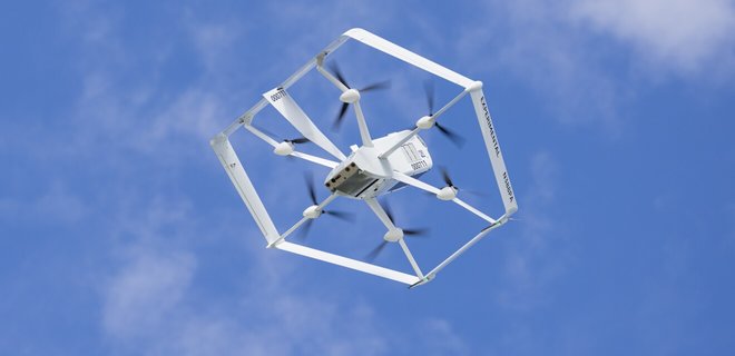 Amazon запустила доставку заказов дронами в двух американских штатах - Фото