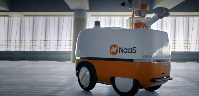 Китайська компанія NaaS представила мобільного робота для заряджання електромобілів - Фото