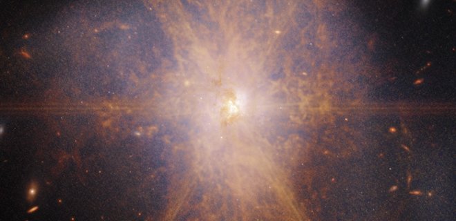 Телескоп Джеймса Уэбба показал, как сливаются две галактики – фото - Фото